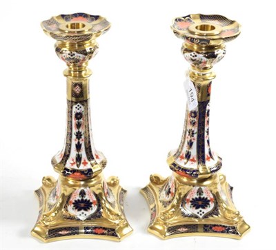 Lot 194 - A pair of Royal Crown Derby Imari candlesticks, 27cm diameter