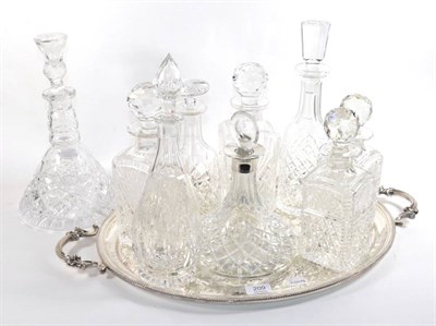 Lot 209 - A silver collared ships decanter, a pair of Stuart cut glass decanters, a ships decanter with...