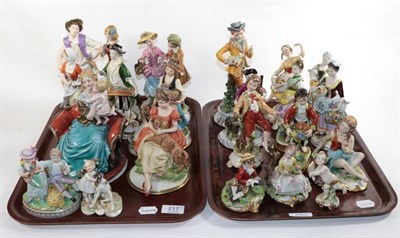 Lot 217 - Two trays of various Continental porcelain figures including Capodimonte