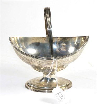 Lot 222 - A George III silver swing handled sugar basket, Peter & Anne Bateman, London 1797, navette shape on