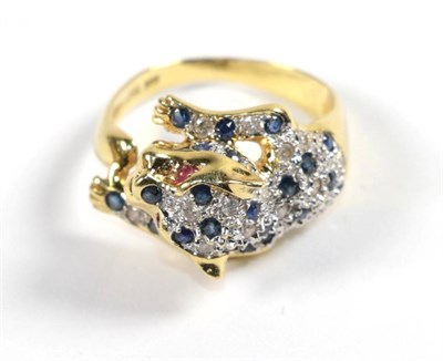 Lot 252 - A Cartier style gemset leopard ring, stamped '18K', finger size L