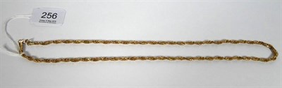 Lot 256 - A rope twist chain, stamped '750', length 61cm