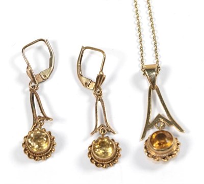 Lot 261 - A 9 carat gold citrine pendant on chain (chain unmarked), pendant length 3cm, chain length...