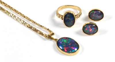 Lot 262 - An opal triplet ring, stamped 'K18', finger size Q1/2, an opal triplet pendant, stamped 'K18'...