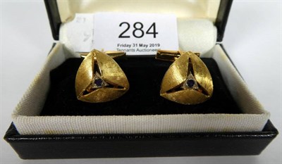 Lot 284 - A pair of sapphire cufflinks, stamped 'K18'