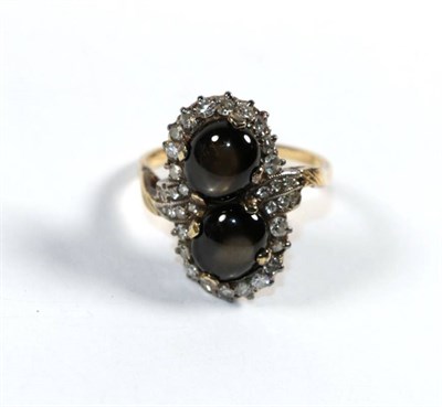 Lot 287 - A diamond and cats eye chrysoberyl dress ring, unmarked, finger size M