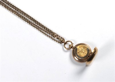 Lot 289 - A 1912 and 1914 sovereign; another coin; and a sovereign holder on a guard chain