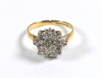 Lot 293 - An 18 carat gold diamond cluster ring of foliate form, finger size H1/2