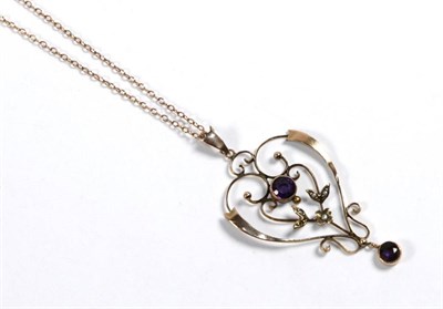 Lot 299 - An Edwardian amethyst and seed pearl pendant on chain, pendant length 5cm, chain length 42cm