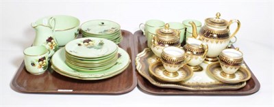 Lot 309 - An eight piece Victorian tea set and a porcelain cabaret set