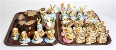 Lot 325 - A collection of Beswick Beatrix Potter figures and character jugs, signed John Beswick;...