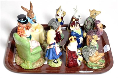 Lot 331 - A set of nine Beswick ''Alice Series'' Alice in Wonderland figures; together with a Royal...