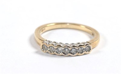 Lot 341 - A 9 carat gold diamond seven stone ring, finger size N