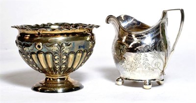 Lot 360 - An early Victorian silver cream jug of George III style, Charles Lias, London, 1839, with...