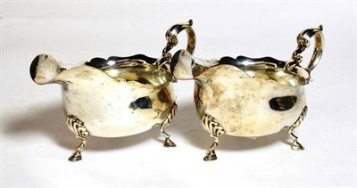 Lot 361 - A pair of silver sauceboats of 18th century style, Birmingham, 16cm long, 11.6ozt