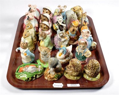 Lot 368 - Beswick Beatrix Potter figurines including: Little Pig Robinson Spying; Mrs Tiggywinkle Takes...