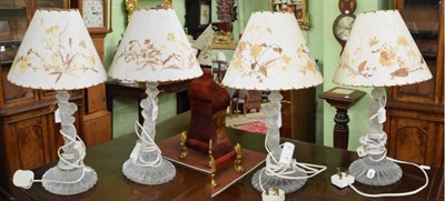 Lot 396 - A pair of Baccarat style moulded glass lamp bases, 20th century, the stems modelled as...