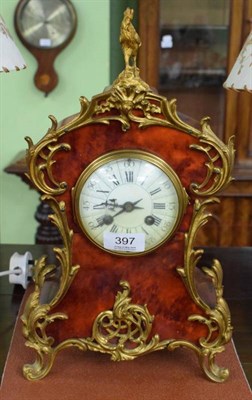 Lot 397 - A French striking tortoiseshell veneered gilt metal mounted mantle clock