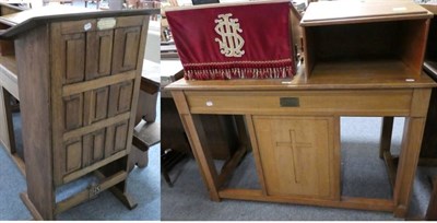 Lot 1135 - An oak alter table; two oak book rests; and an oak lectern, the alter and lectern bearing...