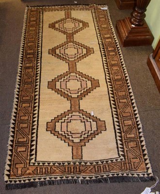 Lot 1158 - Kashgai Gabbeh rug, the cream field with four stepped medallions enclosed by triple borders,...