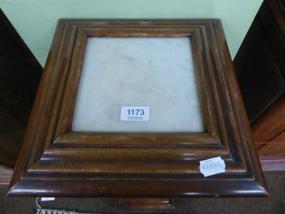 Lot 1173 - A mahogany marble top pedestal