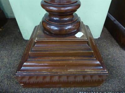 Lot 1173 - A mahogany marble top pedestal