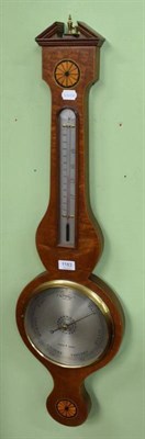 Lot 1183 - An inlaid mahogany wheel barometer bearing name Negretti and Zambra