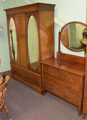 Lot 1185 - A mahogany inlaid double door wardrobe together with a three height chest of drawers