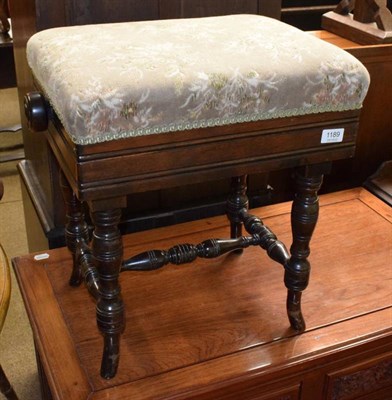 Lot 1189 - An oak adjustable piano stool, on turned supports, stamped to underside 'H&AG'? Co Ltd' to...