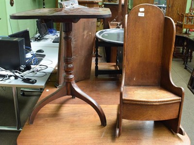 Lot 1190 - A 19th century oak childs commode rocking chair, a George III mahogany flip-top tripod table; and a