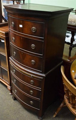 Lot 1194 - A bow fronted six-height chest of drawers