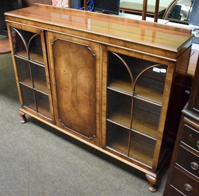 Lot 1196 - A walnut veneered glazed bookcase
