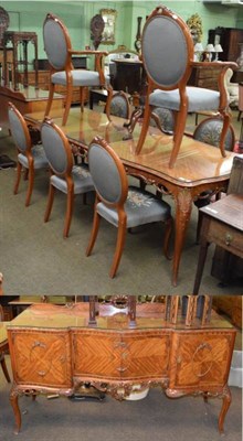Lot 1207 - A 1950s Epstein dining suite comprising extending dining table with one additional leaf, eight...