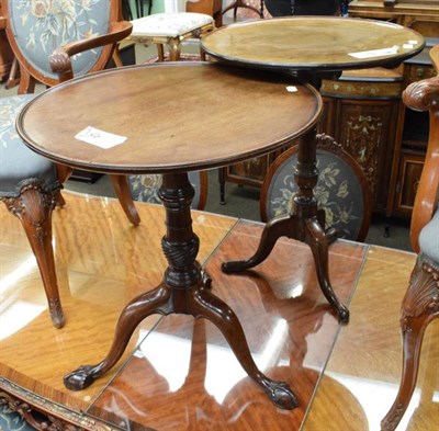 Lot 1208 - A mahogany tripod table; and a mahogany occasional table raised on claw feet (2)