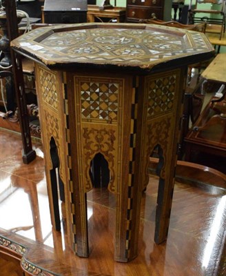 Lot 1210 - A Middle Eastern mother of pearl inlaid occasional table