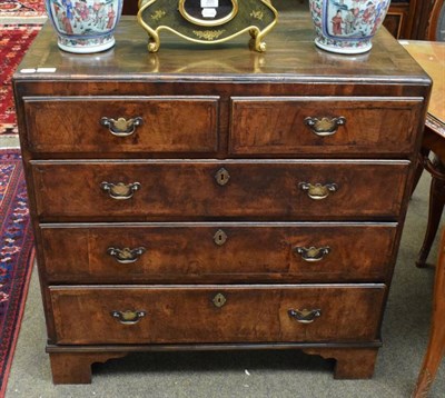 Lot 1213 - A mid-18th century walnut and crossbanded caddy top chest of drawers, two short over three long...