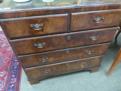 Lot 1213 - A mid-18th century walnut and crossbanded caddy top chest of drawers, two short over three long...