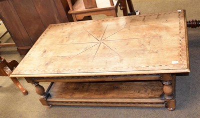 Lot 1240 - An oak inlaid rectangular form coffee table