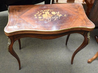 Lot 1242 - Louis XV style rosewood and marquetry inlaid fold over card table, gilt-metal mounts, cabriole...