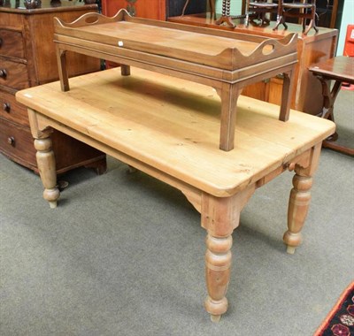 Lot 1243 - A pine kitchen table and a mahogany coffee table