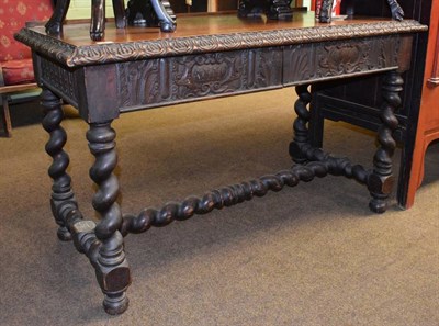 Lot 1254 - A Victorian carved oak side table