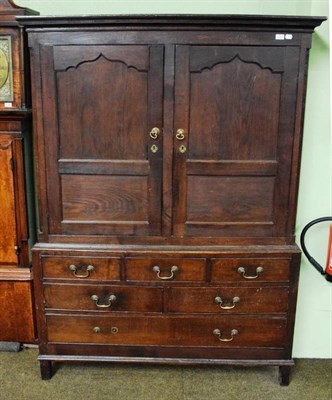 Lot 1268 - An 18th century livery cupboard