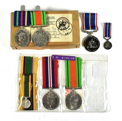 Lot 24 - A Cadet Forces Medal, awarded to FG OFF F.A.YEOMAN, RAFVR (T), with miniature; a Defence Medal...