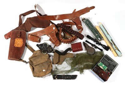 Lot 175 - A Quantity of Militaria, including a cavalry compass; leather pistol holsters; cartridge belts; gas