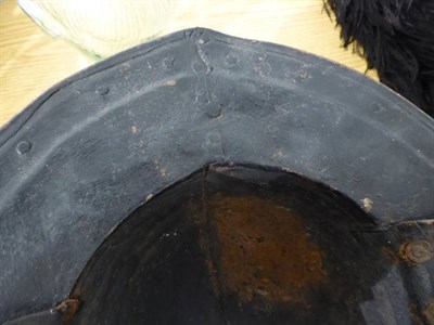 Lot 191 - An English Civil War Pikeman's Helmet, the two piece skull with folded raised medial ridge, the two