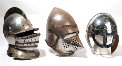 Lot 194 - Three Medieval Style Steel Helmets, comprising a close helmet with high comb, a basinet and a...