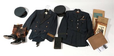 Lot 199 - An RAF Uniform to Flight Lieutenant Thomas ''Tommy'' McCarthy, comprising two peaked caps, a...