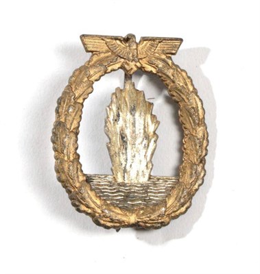 Lot 205 - A German Third Reich Minesweeper Badge, the reverse with vertical sword shape pin, moulded...
