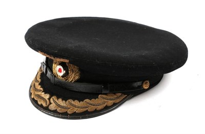 Lot 206 - A German Third Reich Kriegsmarine Officer's Peaked Cap, in dark navy/black wool with mohair...