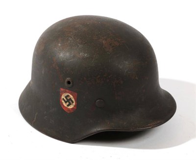Lot 217 - A German Third Reich M35 Police Double Decal Helmet, with dark green finish, police and party...